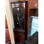 A mahogany corner cupboard with astragal glazed door COLLECT ONLY