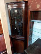 A mahogany corner cupboard with astragal glazed door COLLECT ONLY