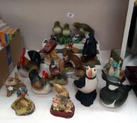 A quantity of porcelain bird figures etc including chickens COLLECT ONLY