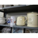 A quantity of teapots, biscuit jar etc.,