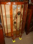 A 1960's bow front china cabinet, COLLECT ONLY.