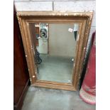 A large gilt framed bevel edged mirror. COLLECT ONLY