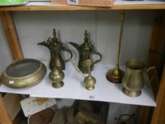 A mixed lot of old brass ware.