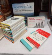 A quantity of books on walks in the UK by Wainwright