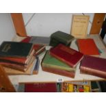 A mixed lot of old books.