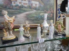 A quantity of Victorian and later figures.