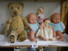 A quantity of vintage dolls and an old teddy bear, a/f.