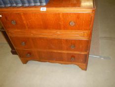 A mid 20th century oak ply three drawer chest, COLLECT ONLY.