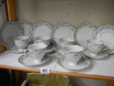 An eighteen piece porcelain tea set. COLLECT ONLY.