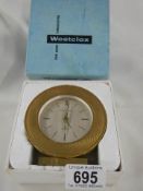 A boxed Westclox mantel clock.