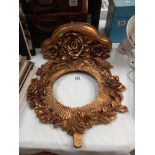 An ornate gilded circular mirror frame (no glass) COLLECT ONLY