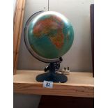 A 9" diameter globe with light, in working order COLLECT ONLY