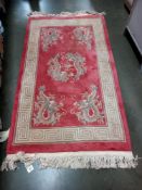 A pink rug 150cm x 90cm approx COLLECT ONLY
