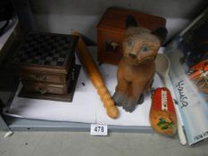 A mixed lot of wooden items including cat, truncheon, box etc.,