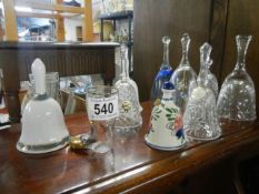 A quantity of glass and ceramic bells.