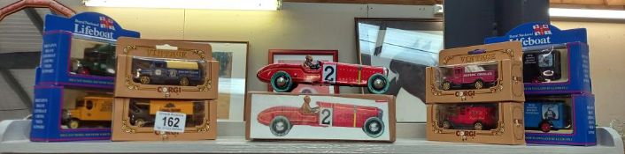 A boxed tin plate clockwork racing car & 8 boxed Corgi & Lledo cars