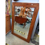 A large teak framed mirror Collect only