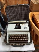 A vintage Lilliput typewriter in carry case COLLECT ONLY