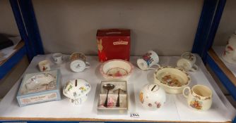 A shelf of baby pottery including Royal Doulton Bunnykins etc. COLLECT ONLY