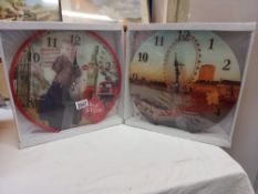 2 London wall clocks, 1 with Marlyn Monroe Collect only