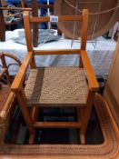 A vintage child's rocking chair with rope twist seat COLLECT ONLY