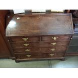 A mahogany bureau with brass drop handles, COLLECT ONLY.