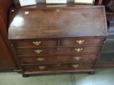 A mahogany bureau with brass drop handles, COLLECT ONLY.