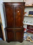 A four door mahogany corner cupboard, COLLECT ONLY.