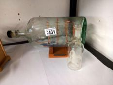 An early to mid 20th century old ship in a bottle & 1 other COLLECT ONLY