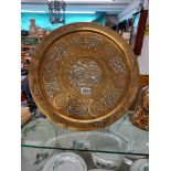 A large 19/20th century Cairo ware Mamluk brass charger/tray decorated with white metal and
