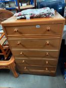 A mid 20th century oak chest of drawers, COLLECT ONLY.