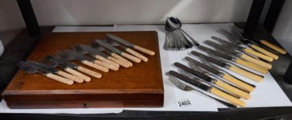 A wooden cutlery case and 2 sets of cutlery COLLECT ONLY
