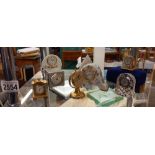 A selection of miniature decorative clocks including pewter, Edinburgh Crystal etc.