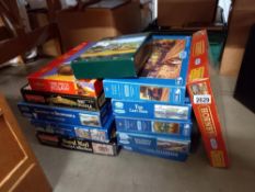 A quantity of jigsaw puzzles including unopened Hornby (completeness unknown) COLLECT ONLY
