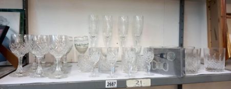 A large shelf of drinking glasses including Irish coffee Collect only