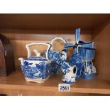 A quantity of blue & white pottery including windmill, teapot & cockerel etc.
