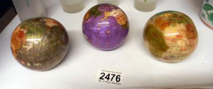 3 decorative globe paperweights