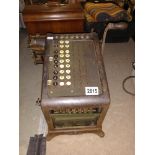A large early burroughs adding machine with bevelled glass viewing panels Collect only
