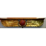 A gilded resin replica of an Egyptian Temple pediment figure, Length 98cm Collect only