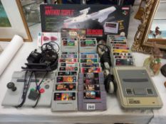 A Super Nintendo console, boxed Scope 6 and quantity of games etc. Collect Only