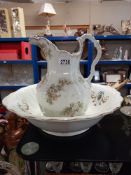 A Victorian Ridgway water jug in an unmarked wash bowl