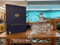 A boxed Bohemia crystal decanter and 2 glasses Collect Only