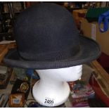 A vintage Norton & Co bowler hat (head not included)