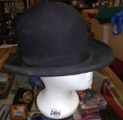 A vintage Norton & Co bowler hat (head not included)