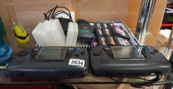 A Sega Game Gear and quantity of games. Collect Only