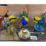 A quantity of glass paperweights. Collect Only