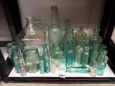 A shelf of old glass bottles COLLECT ONLY