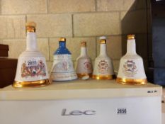 4 empty Royalty Wade decanters and 1 other Collect Only