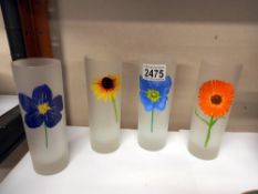 A set of 4 Dartington design glasses