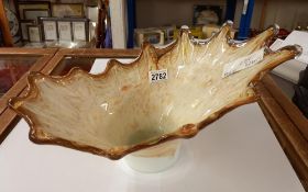 A large studio glass bowl with a frilled edge in tones of yellow, white mottled colours Collect only